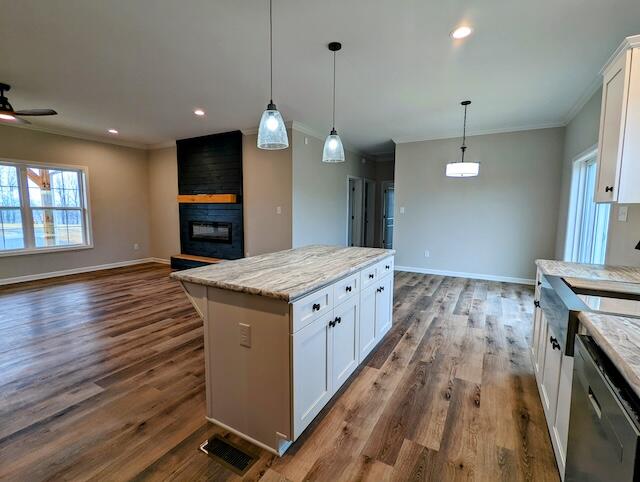 1345 Hale Road Northeast Check, VA 24072 - Photo 21 of 38 wooden floor in an empty room with a kitchen