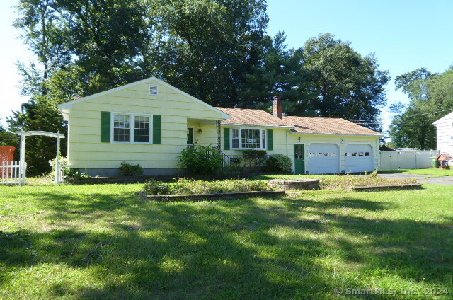 60 Lacava Road Bristol, CT 06010 - Photo 1 of 1 a front view of a house with a yard