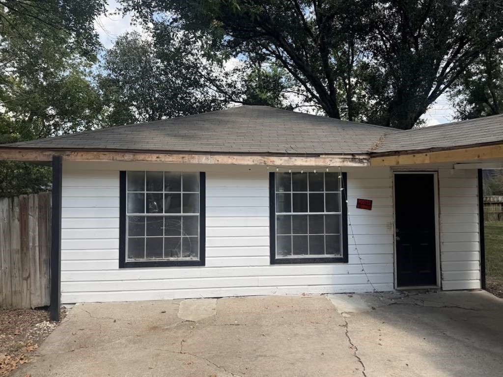 2509 River Ridge Conroe, TX 77385 - Photo 11 of 11 a front view of a house with a tree