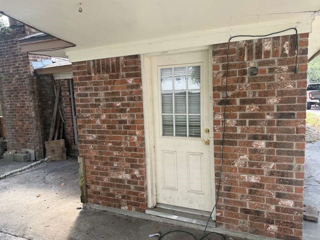 2509 River Ridge Conroe, TX 77385 - Photo 9 of 11 a view of front door of house and window