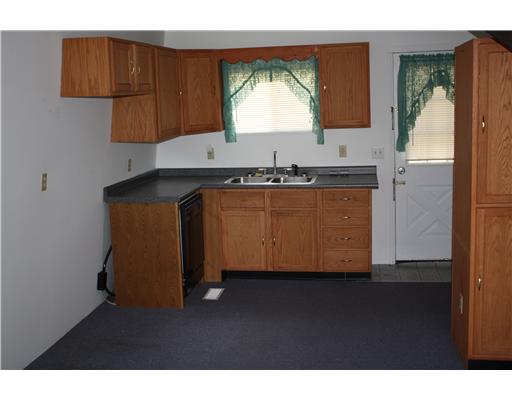 672 Ceylon Road Carmichaels, PA 15320 - Photo 13 of 15 Kitchen. kitchen in rental. 2 bedrooms and 1 bath.Seperate utilities and septic.2 car garage under house. Rent for $5-600 a month and help pay mortgage!