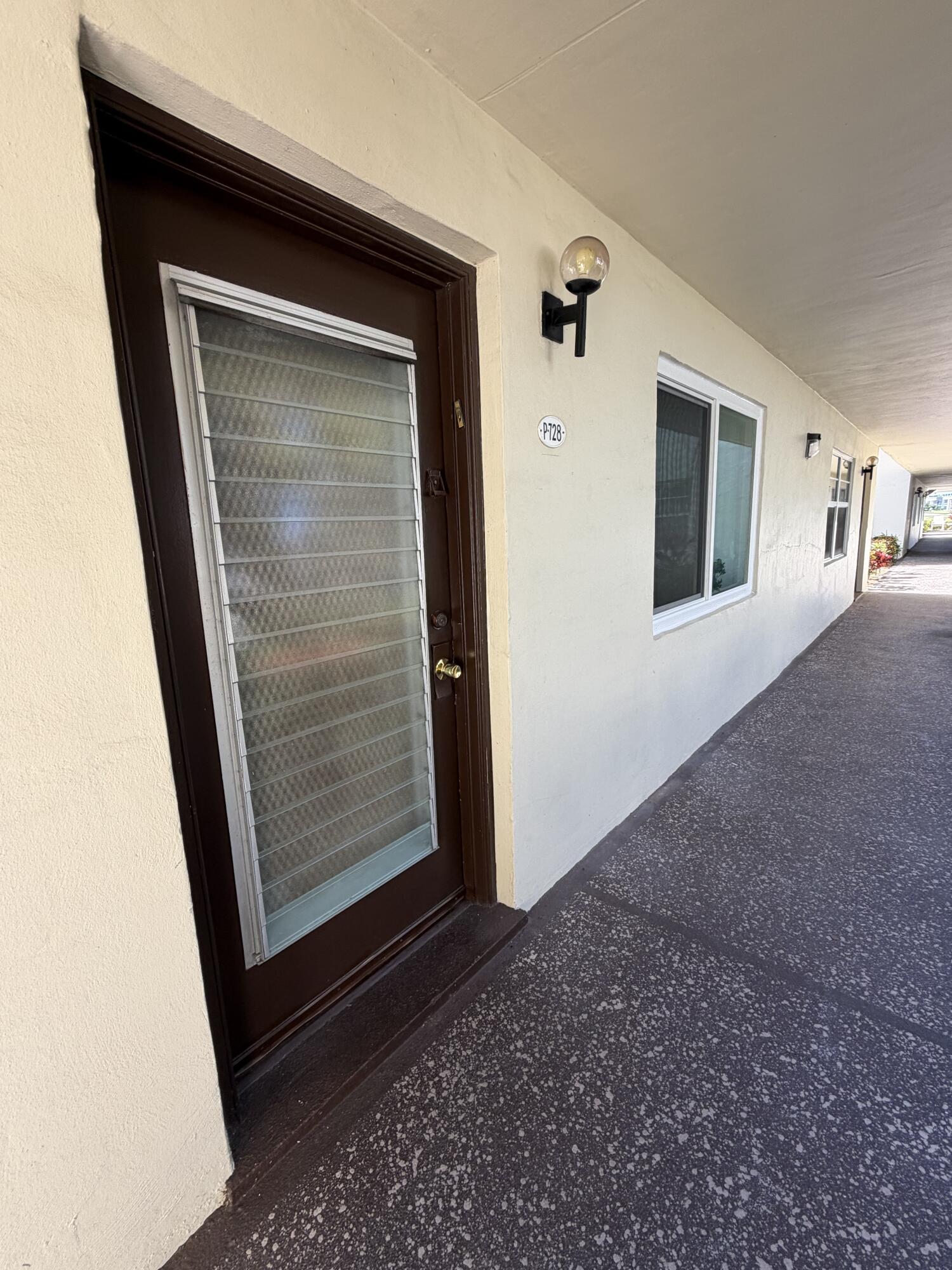 728 Normandy Lane, Unit P Delray Beach, FL 33484 - Photo 3 of 11 door to NORMANDY