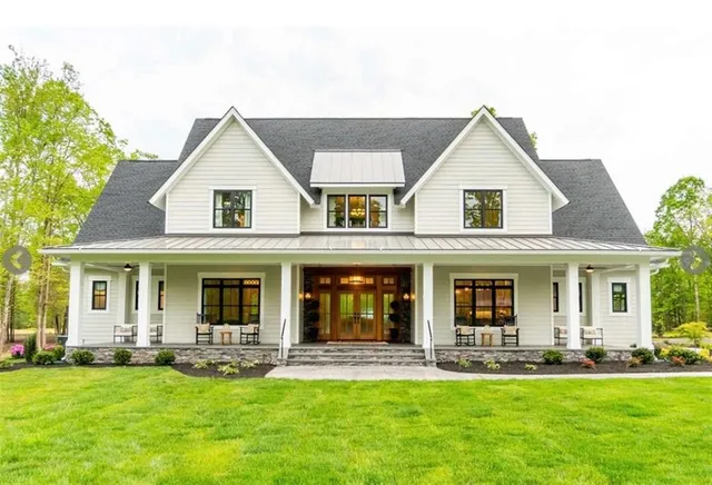 front view of a house with a yard