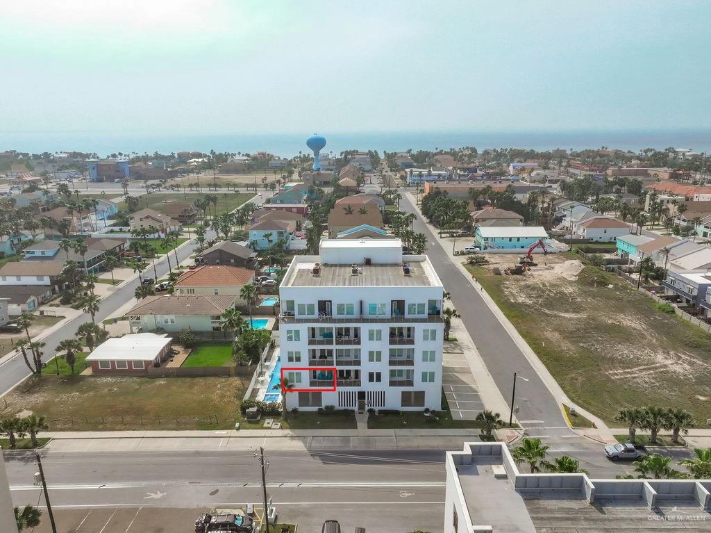 133 East Lantana Street, Unit 103 South Padre Island, TX 78597 - Photo 1 of 25 Drone / aerial view featuring a water view