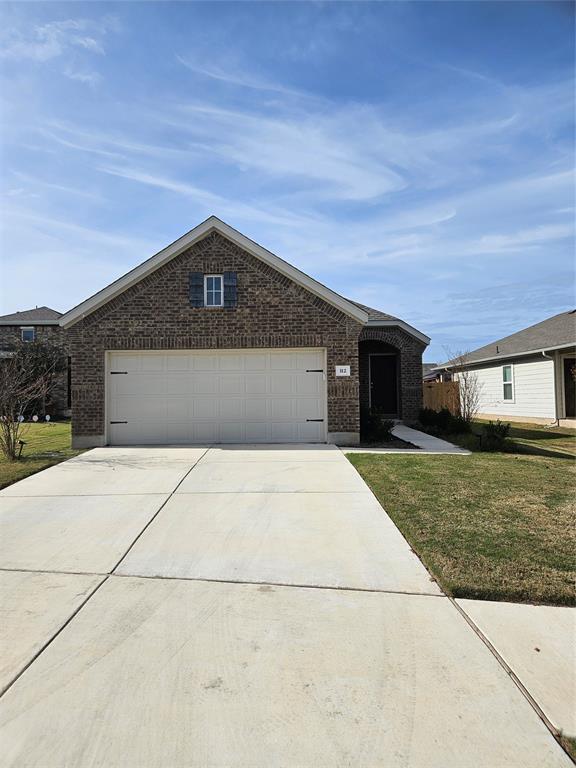 Front of the home with front entry 2 car garage