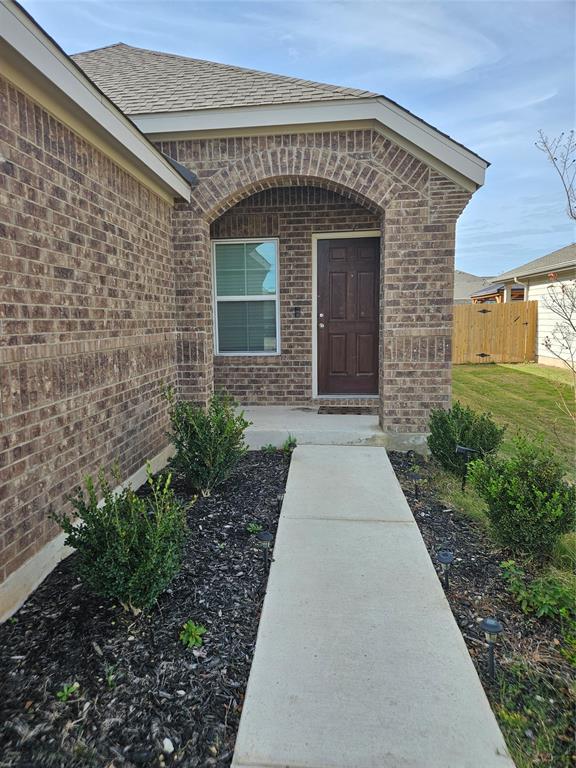 312 Gidran Trail Georgetown, TX 78626 - Photo 2 of 14 Arched exterior entry,