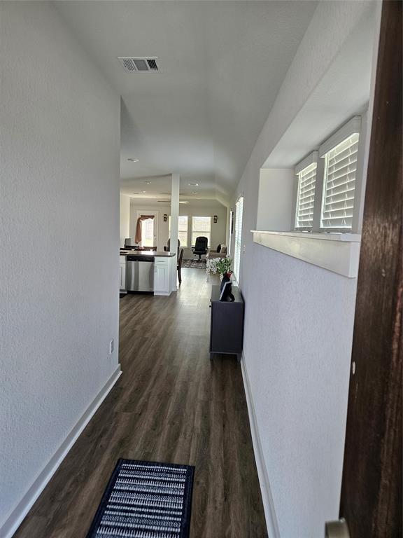 312 Gidran Trail Georgetown, TX 78626 - Photo 8 of 14 Hallway featuring wood-finish flooring