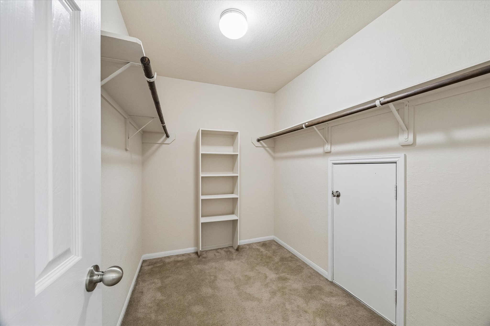 15642 South Fall Fern Circle Houston, TX 77044 - Photo 22 of 32 a view of room with stairs and a closet
