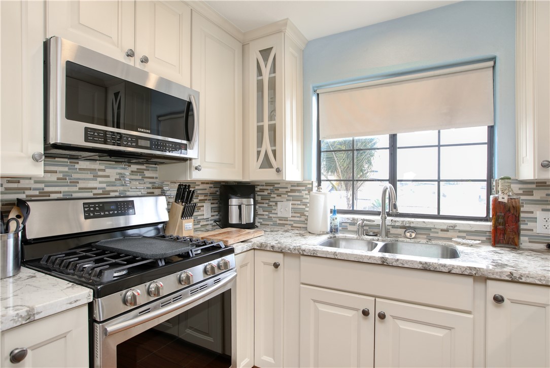 461 Brighton Avenue Grover Beach, CA 93433 - Photo 10 of 46 Remodeled custom kitchen cabinets, granite counters and new appliances