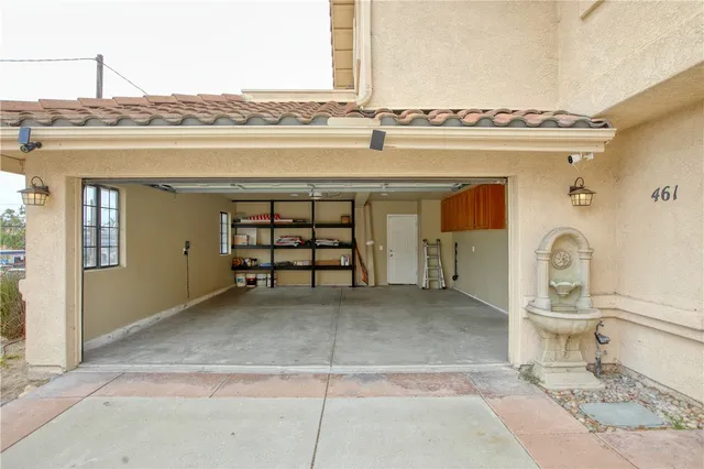 a front view of a house with a garage