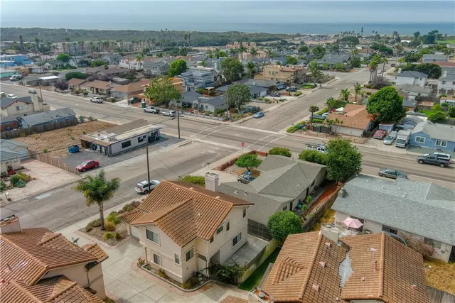 an aerial view of a house with a garden