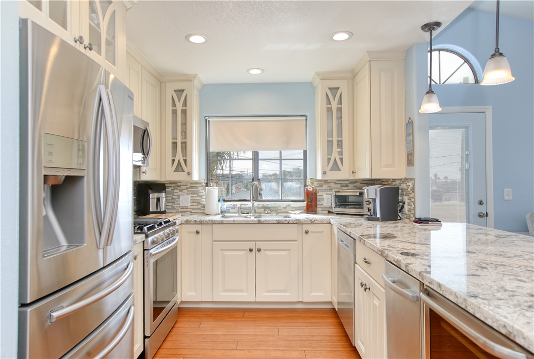 461 Brighton Avenue Grover Beach, CA 93433 - Photo 9 of 46 Remodeled custom kitchen cabinets, granite counters and new appliances