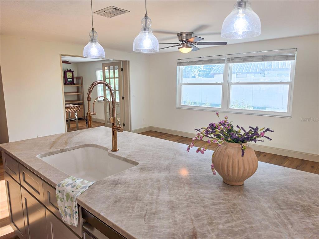 505 Red Mangrove Lane Apollo Beach, FL 33572 - Photo 11 of 24 a view of a livingroom with a chandelier furniture and chandelier
