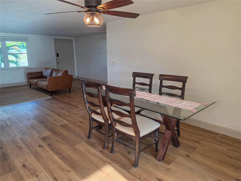 505 Red Mangrove Lane Apollo Beach, FL 33572 - Photo 14 of 24 a view of a livingroom with furniture and a wooden floor