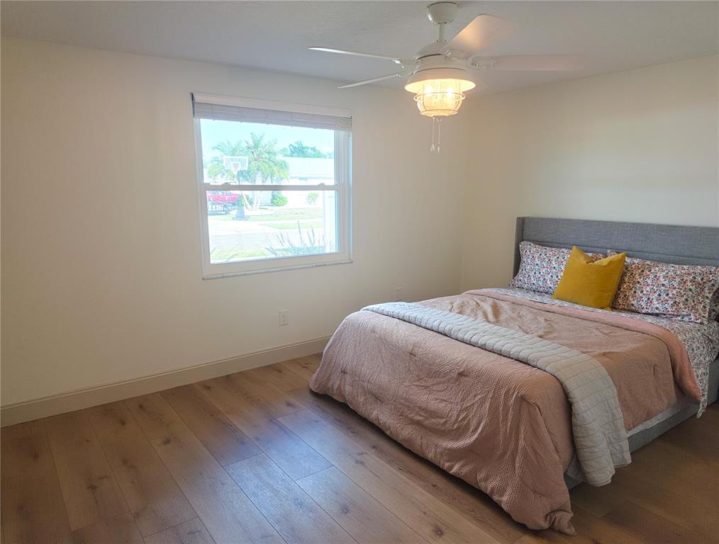 505 Red Mangrove Lane Apollo Beach, FL 33572 - Photo 15 of 24 a bedroom with a bed and a window
