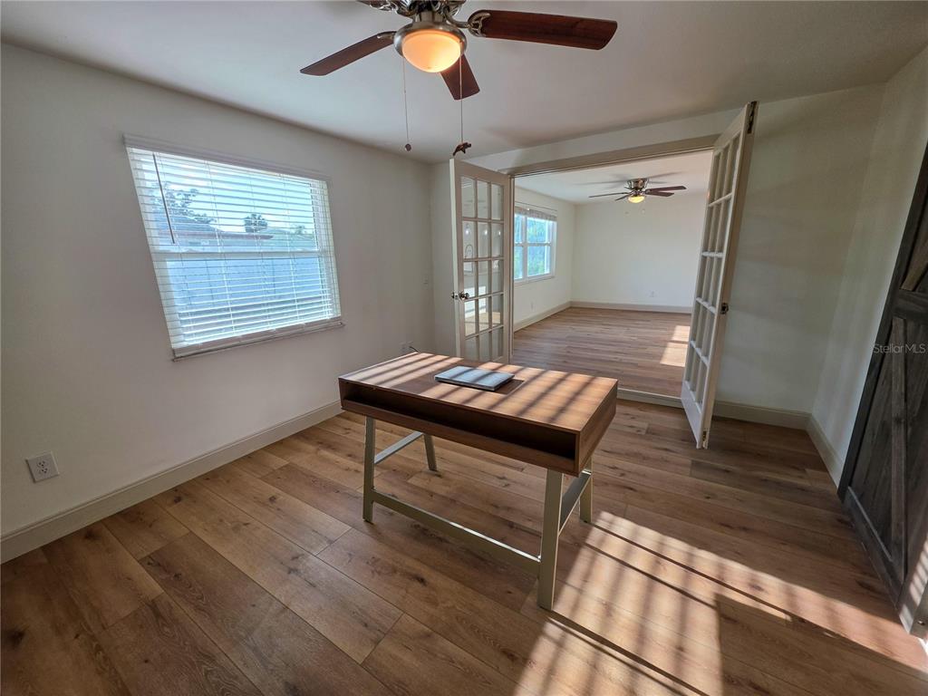 505 Red Mangrove Lane Apollo Beach, FL 33572 - Photo 17 of 24 a view of a hallway to a livingroom with furniture
