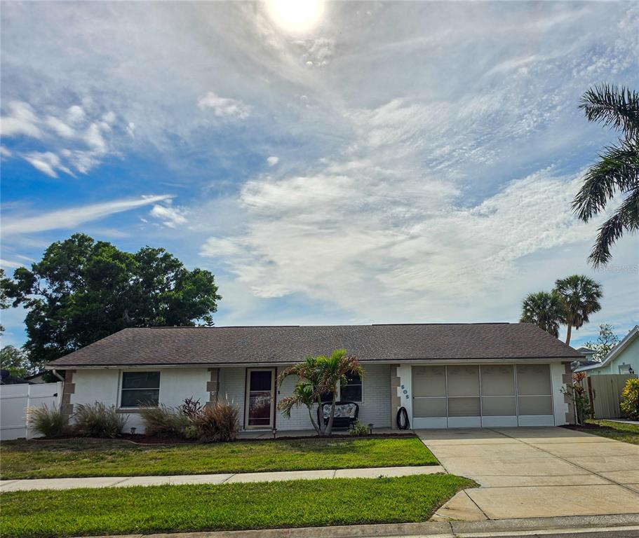 505 Red Mangrove Lane Apollo Beach, FL 33572 - Photo 2 of 24 a front view of a house with a yard