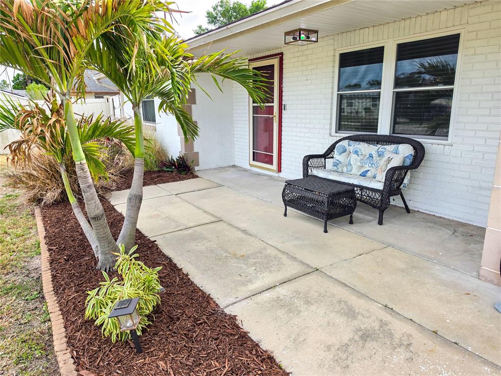 505 Red Mangrove Lane Apollo Beach, FL 33572 - Photo 23 of 24 a view of a two chairs in a patio