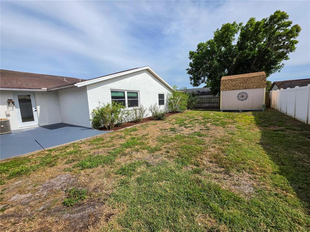 505 Red Mangrove Lane Apollo Beach, FL 33572 - Photo 24 of 24 a house view with a garden space