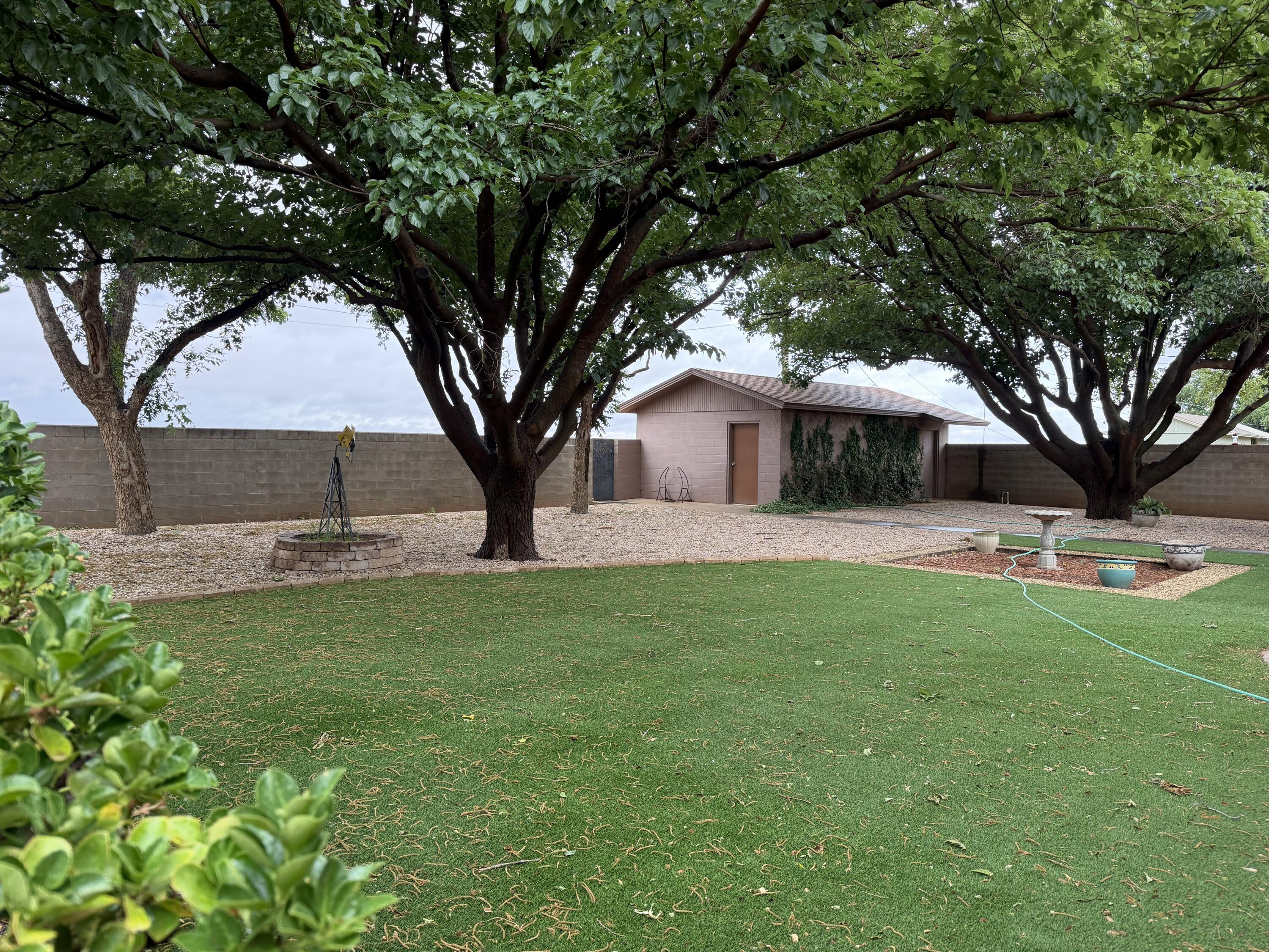 1603 South 8th Street Lamesa, TX 79331 - Photo 34 of 39 a front view of a house with garden