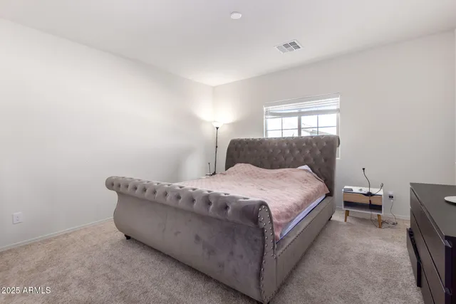 a kitchen with granite countertop a sink and cabinets