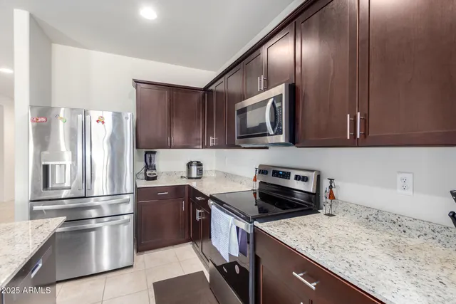 a bathroom with a sink toilet and vanity