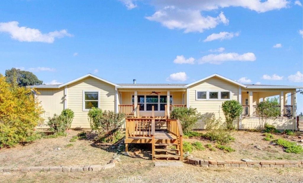 22230 Corning Road Corning, CA 96021 - Photo 1 of 1 a front view of a house with a yard