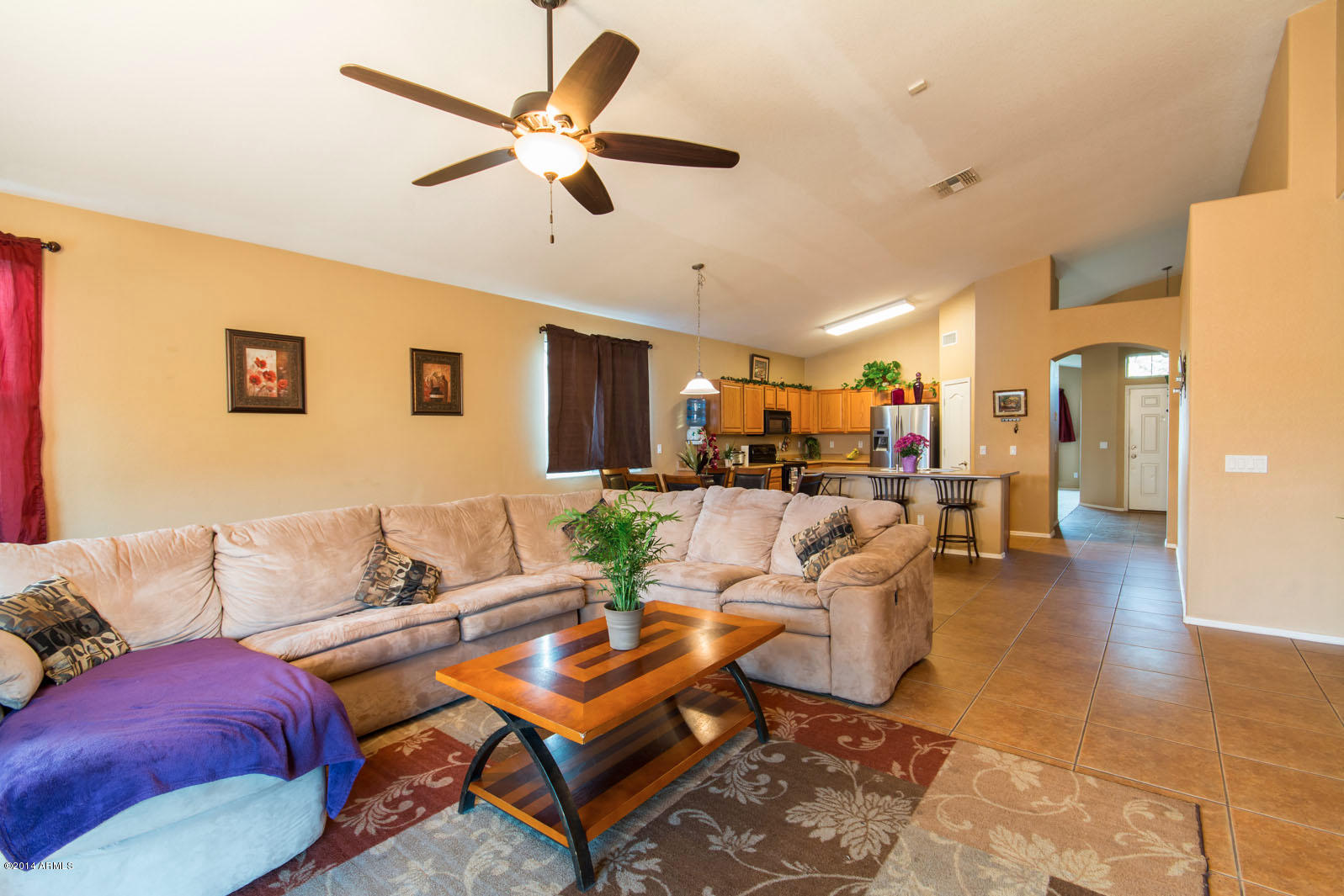3221 West Shumway Farm Road Phoenix, AZ 85041 - Photo 13 of 32 Family room to kitchen