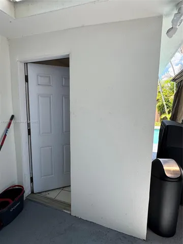 a view of livingroom with furniture and a window