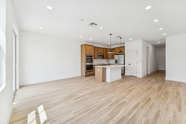 a view of kitchen with wooden floor