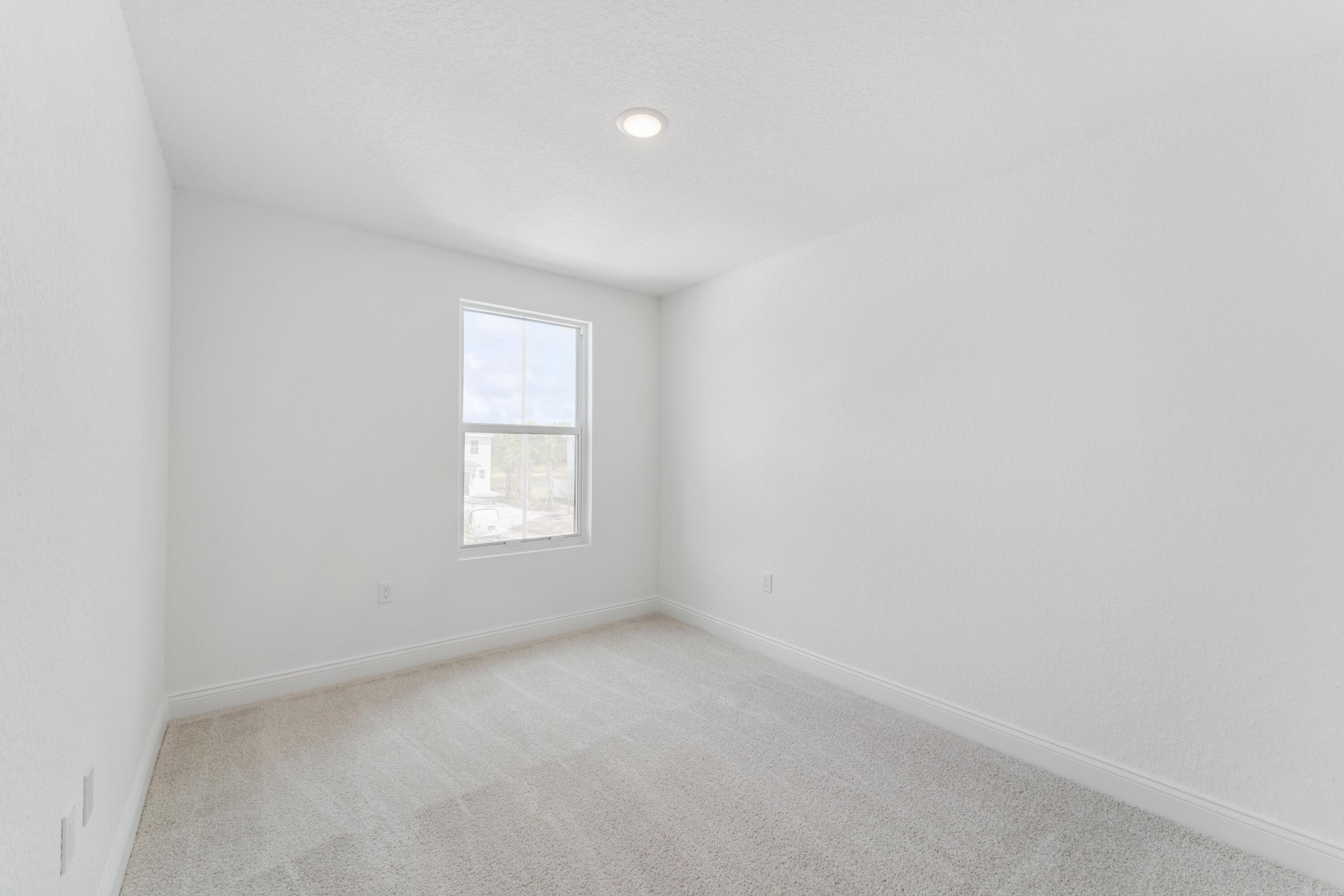 164 Southeast Birch Terrace, Unit 103 Stuart, FL 34997 - Photo 17 of 29 a view of room and window