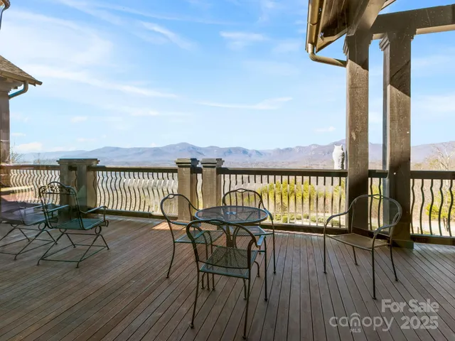 a view of a chairs on the roof deck
