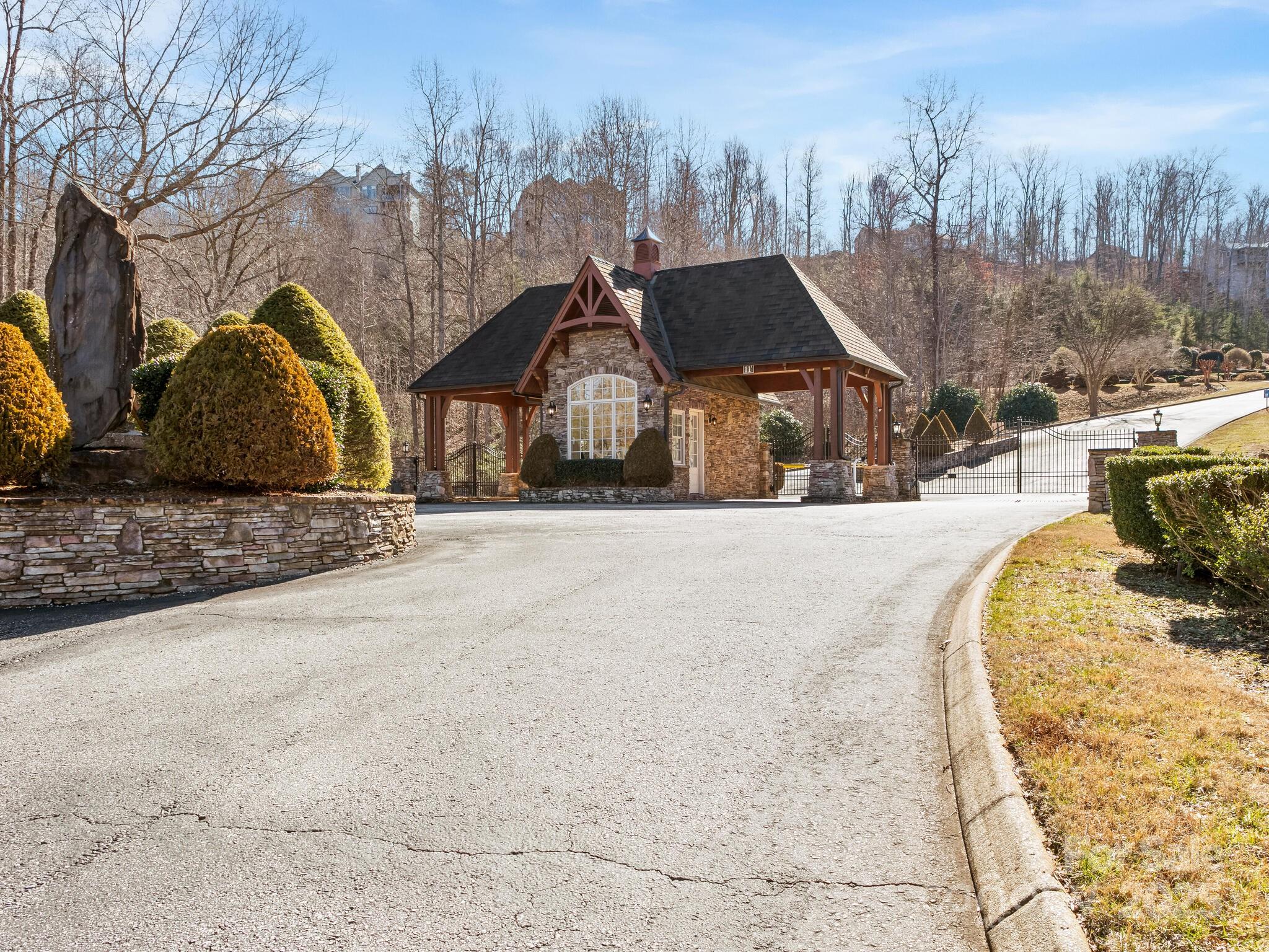 0 Half Moon Mile None, Unit 122 Lake Lure, NC 28746 - Photo 10 of 19 a view of a house with snow on the background