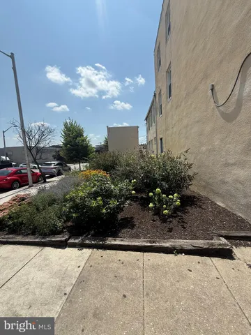 a view of a patio with a yard