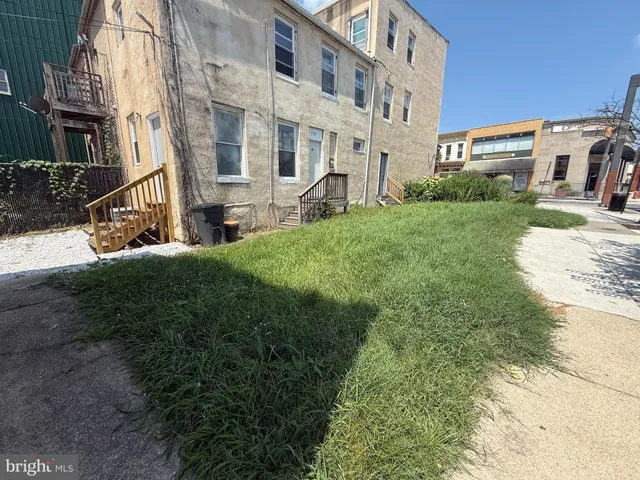 a view of a back yard of the house