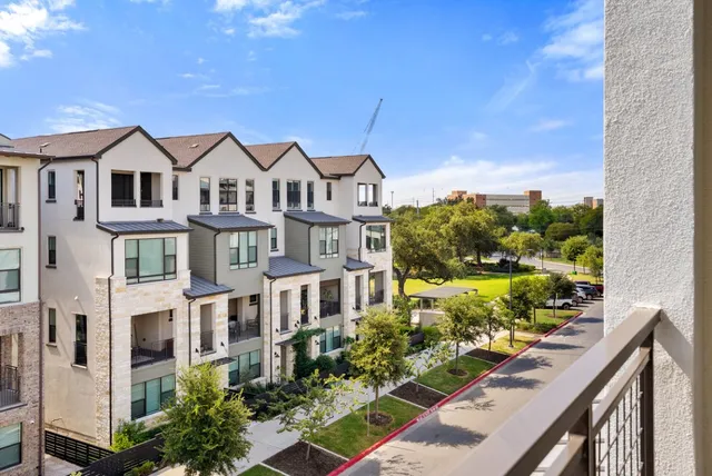 a view of a city from the balcony