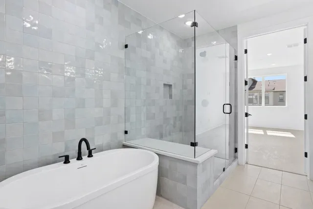 a view of an empty room with windows