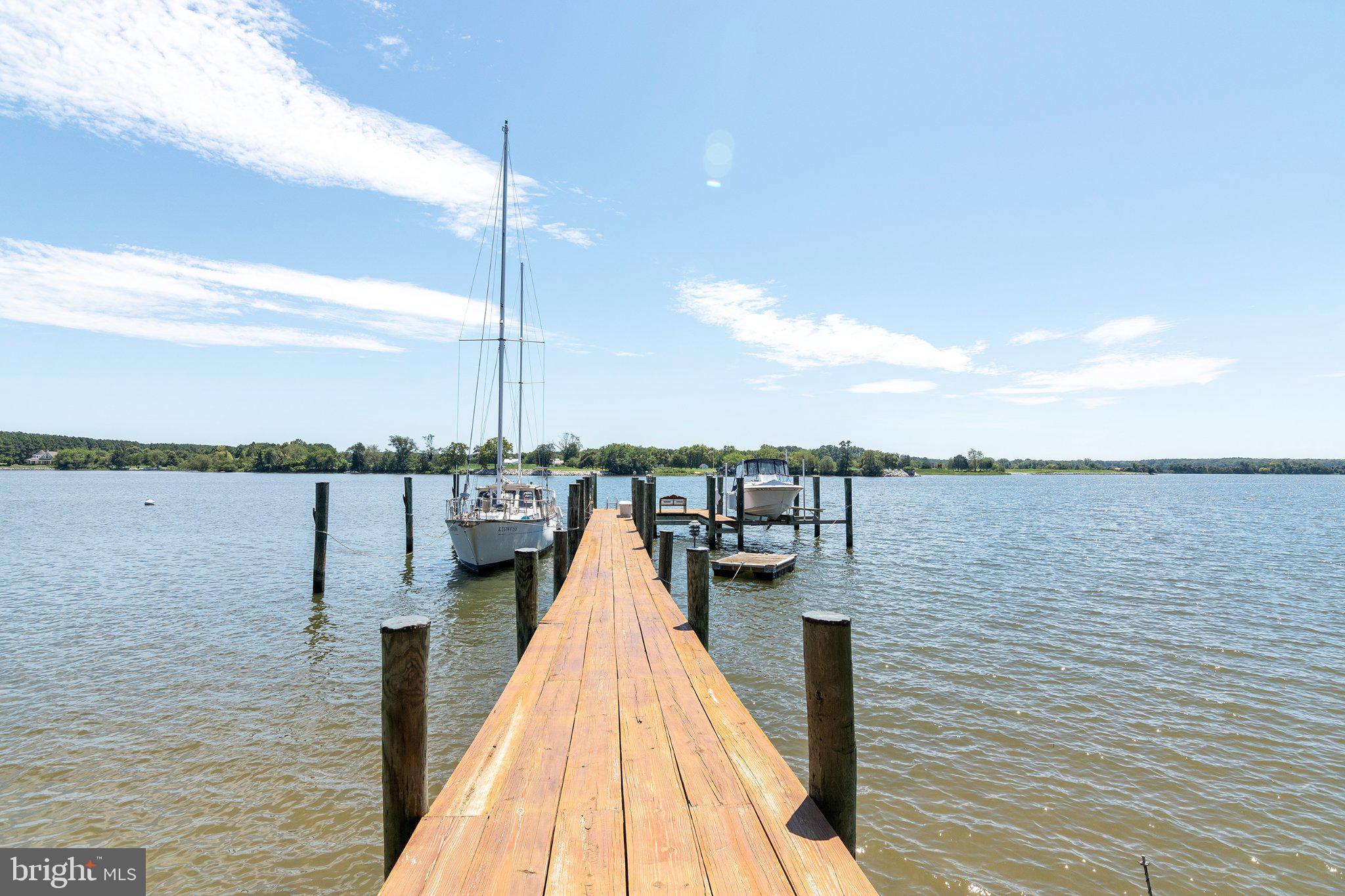 4471 World Farm Road Oxford, MD 21654 - Photo 8 of 42 Tranquil dock by serene waters.