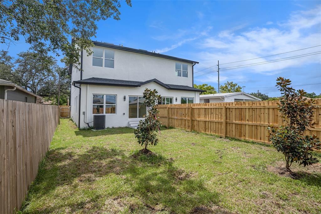 3612 Temple Street Tampa, FL 33619 - Photo 24 of 26 a view of a backyard