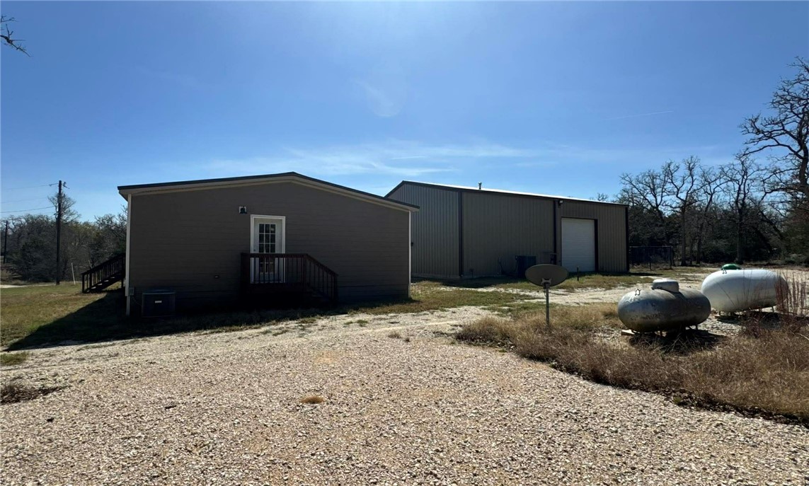 100 Patriots Place Somerville, TX 77879 - Photo 15 of 28 a backyard of a house
