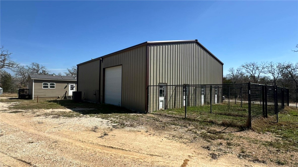 100 Patriots Place Somerville, TX 77879 - Photo 17 of 28 a view of a house with a yard