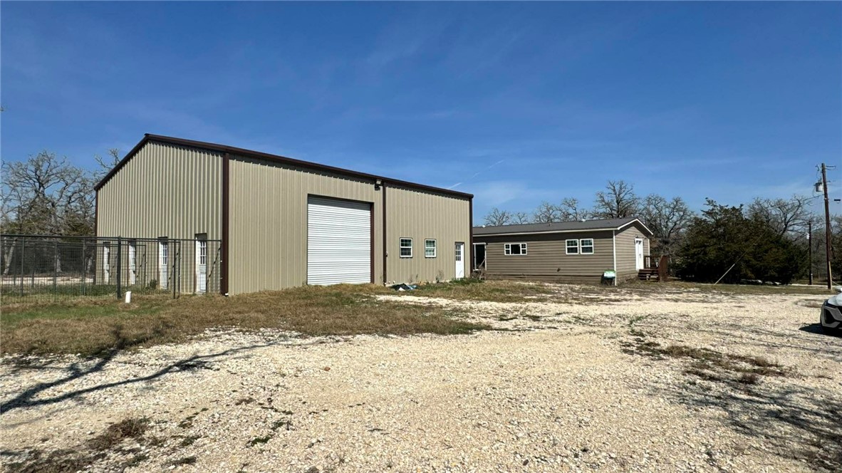 100 Patriots Place Somerville, TX 77879 - Photo 18 of 28 a view of large house with a yard