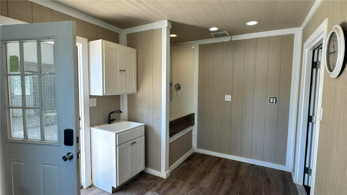 100 Patriots Place Somerville, TX 77879 - Photo 19 of 28 a kitchen with a refrigerator and a sink