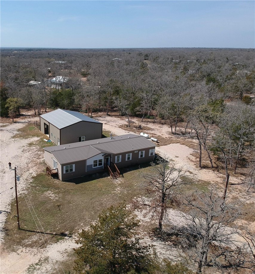 100 Patriots Place Somerville, TX 77879 - Photo 25 of 28 a view of a houses with yard and ocean view