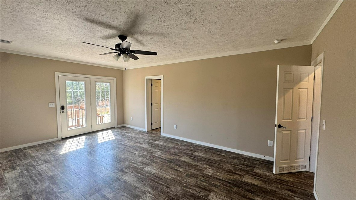 100 Patriots Place Somerville, TX 77879 - Photo 4 of 28 a view of an empty room with a window