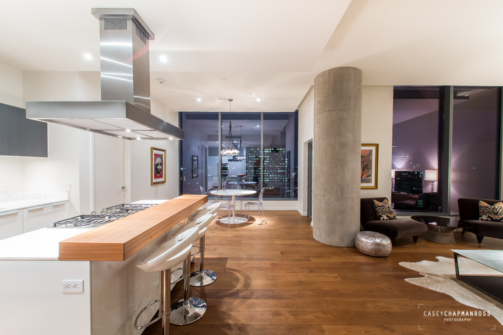 a room with gym equipment and a large window