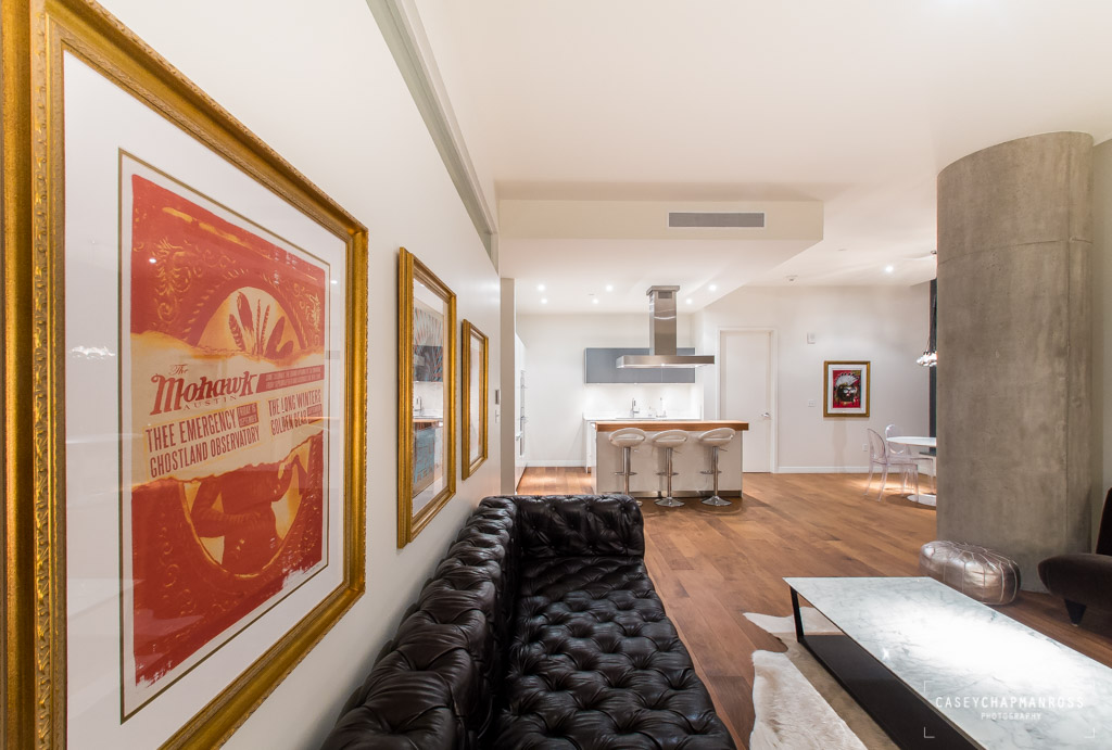 210 Lavaca Street, Unit 1910 Austin, TX 78701 - Photo 13 of 40 a kitchen with stainless steel appliances granite countertop a refrigerator and a stove top oven