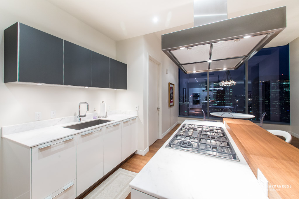 210 Lavaca Street, Unit 1910 Austin, TX 78701 - Photo 2 of 40 a kitchen with sink and cabinets