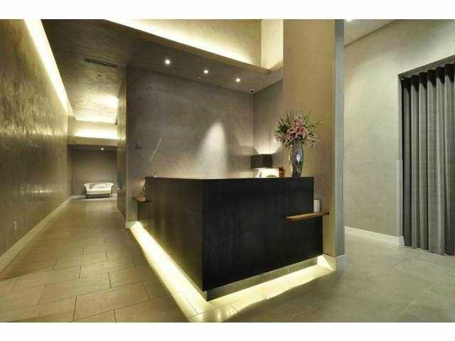 210 Lavaca Street, Unit 1910 Austin, TX 78701 - Photo 30 of 40 a bathroom with a sink and a mirror