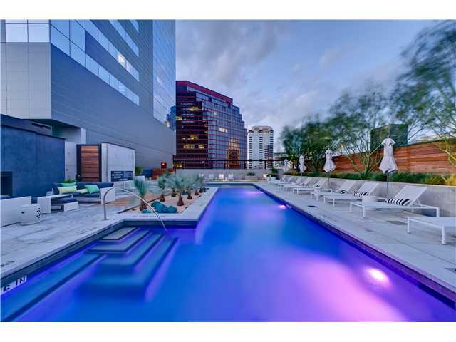 210 Lavaca Street, Unit 1910 Austin, TX 78701 - Photo 32 of 40 a living room with furniture and a wooden floor